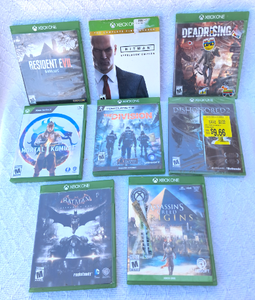 lot 287 image: Xbox video game discs as shown, includes Batman Arkham Knight, Assassins Creed, Mortal Kombat and more