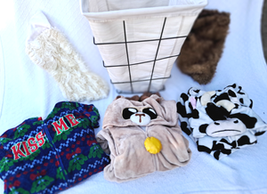 lot 280 image: Adult size pajamas including Goat, Cow, Kiss me Christmas theme, includes clothing hamper plus