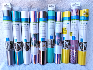 lot 274 image: Cricut Premium vinyl including Textured metalic & Holographic, 10 rolls