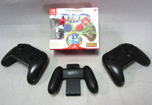 lot 71 image: Nintendo Switch gaming controllers including Realmz wireless Sonic the Hedgehog controller in box