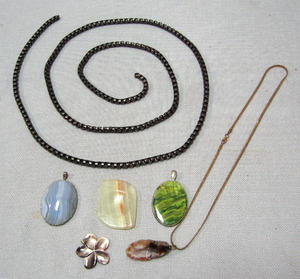 lot 252 image: Hematite chain, Geode stone pendant necklace, Mother of pearl flower pendant, glass pendants