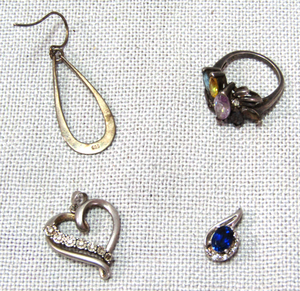 lot 246 image: .925 Silver jewelry, pendant with blue gem stone, ring with gemstones, heart pendant diamond chip stones and single earing