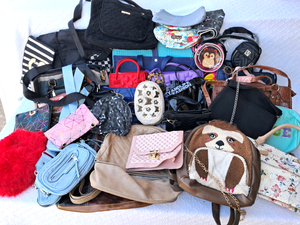 lot 225 image: Assorted Ladies purses and back packs, generous quantity