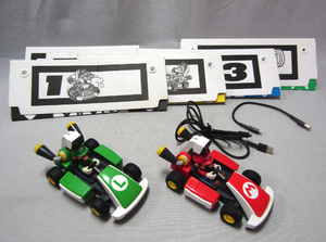 lot 203 image: Nintendo Switch - Mario Kart Live Home Circuit - Luigi & Mario Set - Yes they work