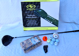 lot 179 image: Athletic Works automatic putting system, Izzo glowing golf ball and Hunter golf ball pack, Blaster Nitro golf club and more