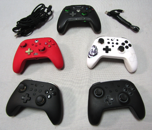 lot 233 image: Gaming controllers as shown
