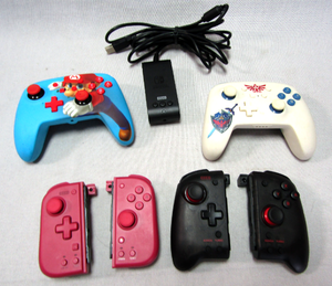 lot 97 image: Gaming controllers for Nintendo Switch