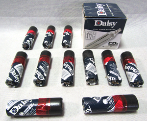 lot 106 image: Daisy premium grade BBs (10 tubes full) plus Daisy powerline Co2 cartridges box full (missing one)