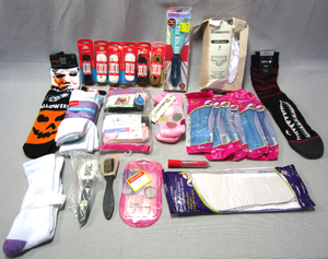lot 114 image: Assorted footware and accessories including socks, gel inserts, laces, pedicure files plus