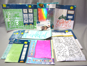 lot 120 image: Assorted arts & craft paper supplies, Stencils, Glitter paper, and more