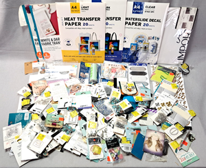 lot 134 image: Arts & Crafts supplies Generous quantity, Heat transfer paper, jewels, decals, charms, and much more