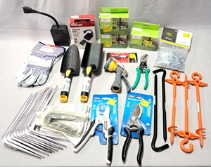 lot 143 image: Gardening supplies and accessories, Hart pruning shears, Hyper Tough wireless outdoor outlet, Mainstays Yard torch deck clamps plus