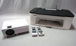 lot 137 image: RCA video projector with remotes and Canon Pixma printer