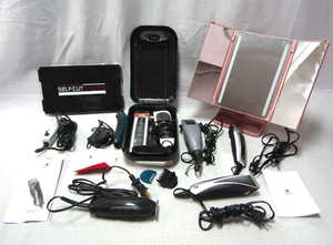 lot 157 image: Andis and other brands hair trimming kits, LED vanity mirror, and more as shown