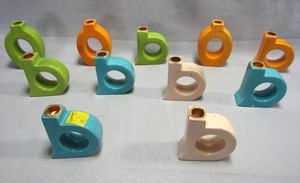 lot 105 image: Ceramic letter candle holders