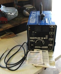 lot 18 image: Chicago Electric Industri Arc 180 Welding Machine. Needs a plug put on it see pictures