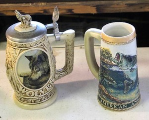 lot 39 image: Vintage 1997 Avon Tribute to the North American Wolf Collectible Stein and Ceramarte American Angler Series Largemouth Bass beer stein