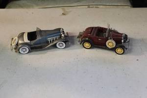 lot 56 image: 132 scale diecast model of a 1935 Duesenberg SSJ convertible and 132 scale diecast replica of a 1931 Ford Model A Roadster