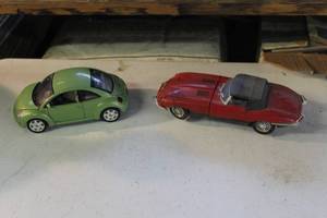 lot 60 image: lime green Bburago Volkswagen New Beetle and red Jaguar E-Type (XKE),