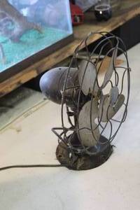 lot 61 image: antique electric desk fan needs a plug put on it