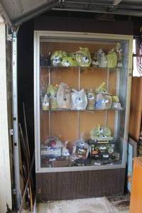 lot 202 image: Display case with locking door and key about 7 foot tall ( contents not included)