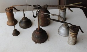 lot 123 image: collection of vintage oil cans, sometimes referred to as oilers or pump oilers,