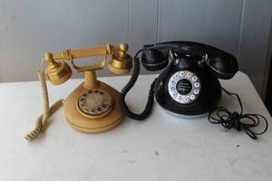 lot 130 image: vintage-style telephones often used for home decor.