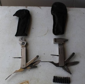 lot 139 image: 2- multi-tools with case