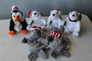 lot 174 image: collection of vintage 1990s Coca-Cola bean bag plush toys, including polar bears, a penguin, and a seal.