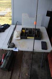 lot 178 image: 2 fishing poles one is a fly fishing pole I believe and tackle box phone in last picture not included 