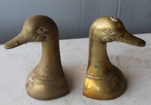 lot 190 image: vintage bookends feature detailed duck or mallard head busts