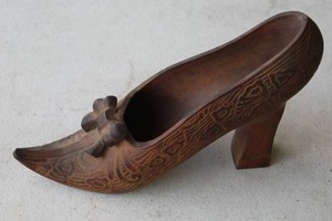 lot 196 image: vintage cast iron shoe