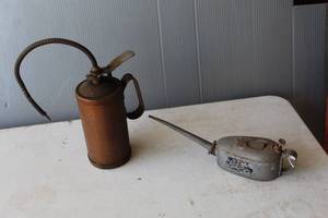 lot 223 image: collection of vintage metal oil cans