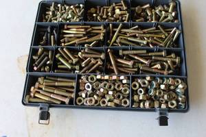 lot 231 image: Nuts and bolts in a plastic carrying case