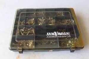 lot 233 image: Nuts and bolts and washers in a plastic carrying