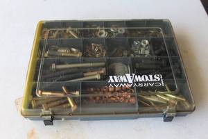 lot 234 image: Nuts and bolts and washers in a plastic carrying