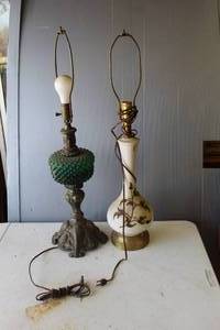 lot 243 image: vintage lamps are collectible home decor items featuring intricate glass and metal designs