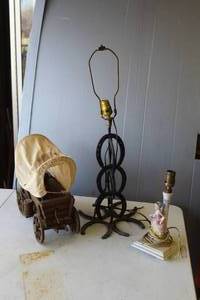 lot 244 image: rustic, handmade lamp constructed from stacked horseshoes, likely part of a Western-themed collection all 3 are lamps