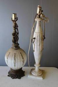lot 247 image: vintage Italian table lamp features a hand-carved alabaster body in a neoclassical urn shape, often adorned with metal ring handles. And a vintage Hollywood Regency style table lamp featuring a brass cherub figure