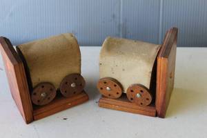 lot 252 image: vintage, handmade American Western Rustic-style wood covered wagon bookends.