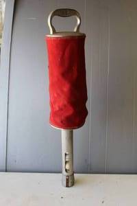 lot 253 image: vintage golf ball retriever, specifically identified as an Original Bag Shag by Madewell Products.  Full of golf balls
