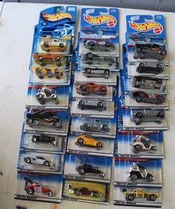 lot 277 image: collection of vintage Hot Wheels die-cast toy cars still in their original packaging. From 2000 and lower and some may have damage to package