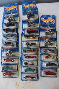 lot 278 image: collection of vintage Hot Wheels die-cast toy cars still in their original packaging. From 2000 and lower and some may have damage to package