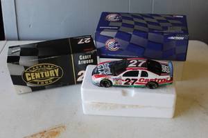 lot 291 image: 1999 Casey Atwood #27 Castrol GTX Last Lap of the Century diecast car. Signed on the hood