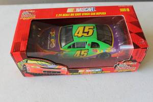 lot 297 image: Signed 124 scale die-cast replica of the #45 NASCAR stock car driven by Adam Petty