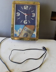 lot 331 image: vintage Coors Light advertising wall clock  works