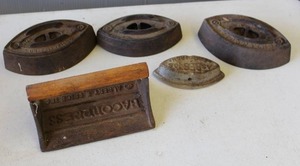 lot 360 image: 4-antique cast iron sad iron, and cast iron bacon press