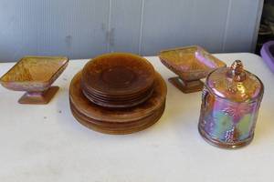 lot 401 image: vintage amber glass is likely Tiara Sandwich Glass