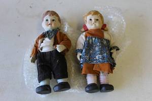 lot 409 image: vintage pair of miniature porcelain dollhouse dolls,
