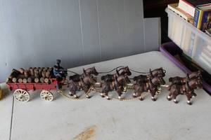 lot 499 image: vintage cast iron toy set depicting a horse-drawn beer delivery wagon
